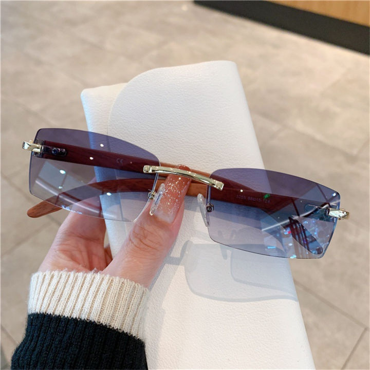 retro Y2K-style rimless rectangle sunglasses,